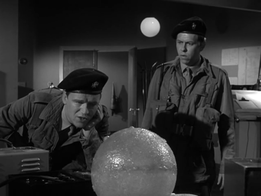 night-caller-7-privates-higgins-waker-l-and-jones-gregory-examine-the-sphere